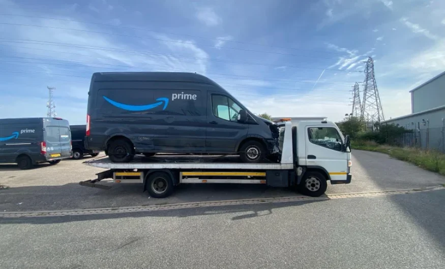 amazon vehicle being towed in east london